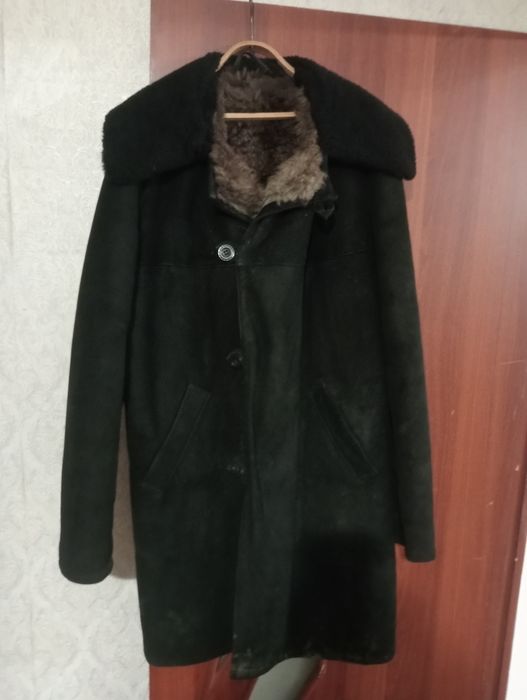 Новый овчинный полушубок.