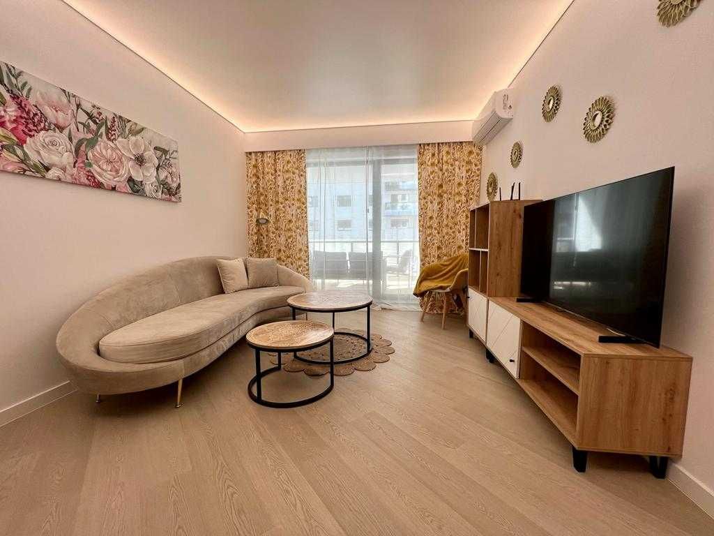 Proprietar Vând in Cortina North 2 camere scara A2 et2  mobilat utilat