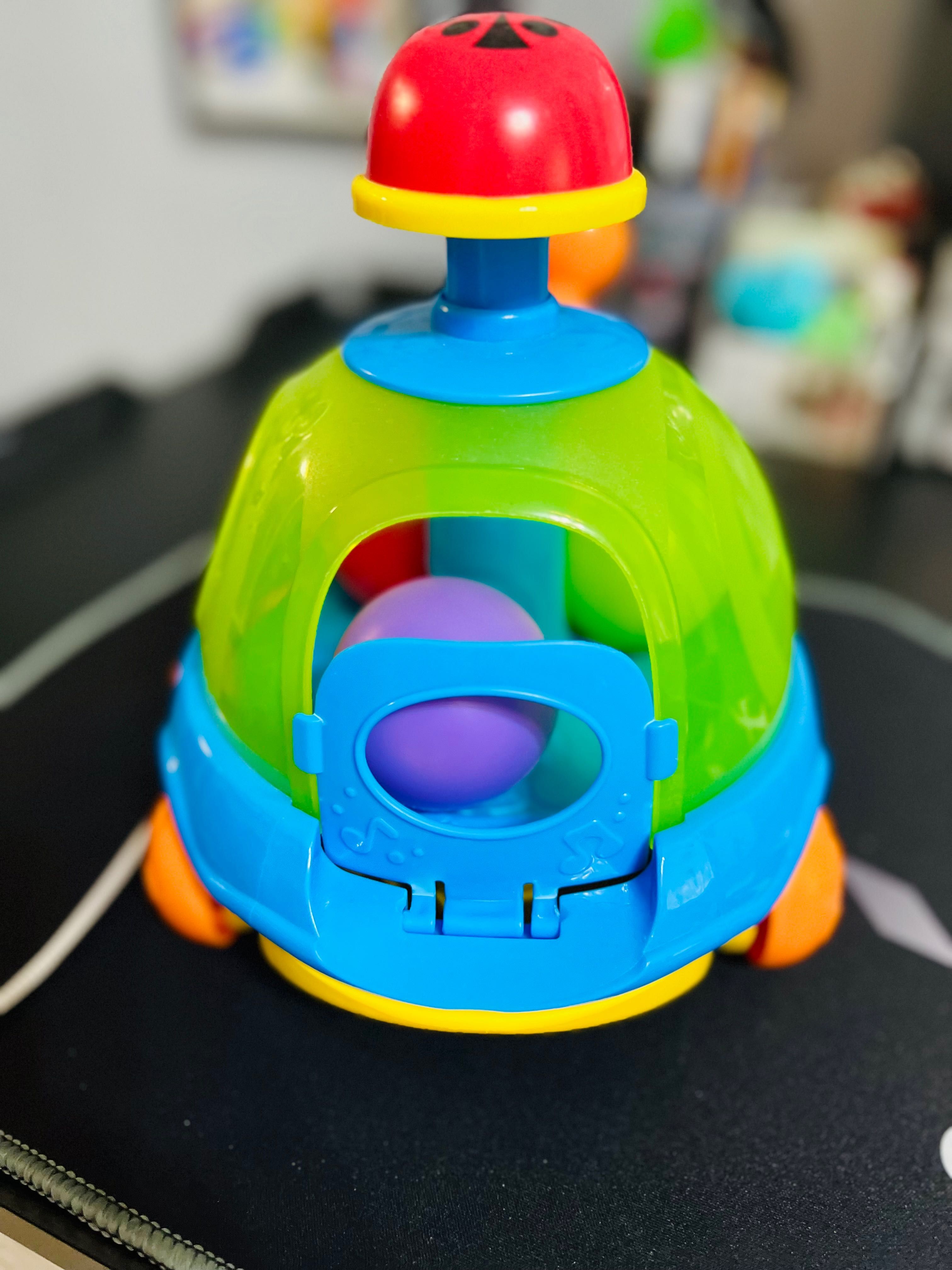 Музикална играчка с топки и въже за дърпане - WinFun охлювче, пумпал