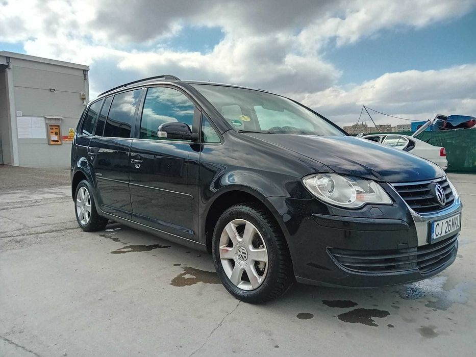 Vand touran 1.9  7 locuri model united