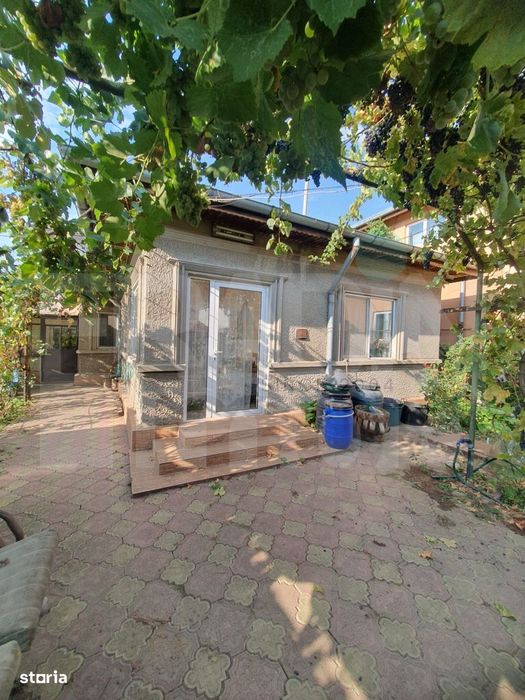 Voluntari - zonă centrală, casă parter, cu deschidere generoasă