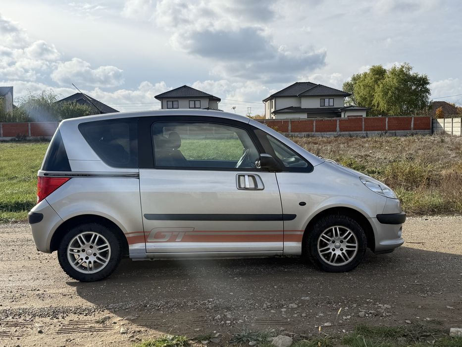 Peugeot 1007 • Diesel 1.4 • Usi automate