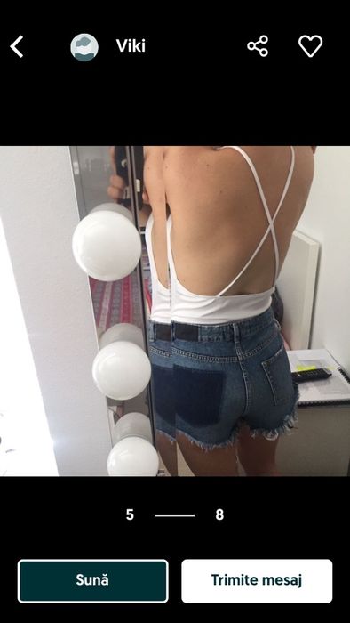 Body alb imaculat, cu spatele gol, bretelele se incruciseaza la spate