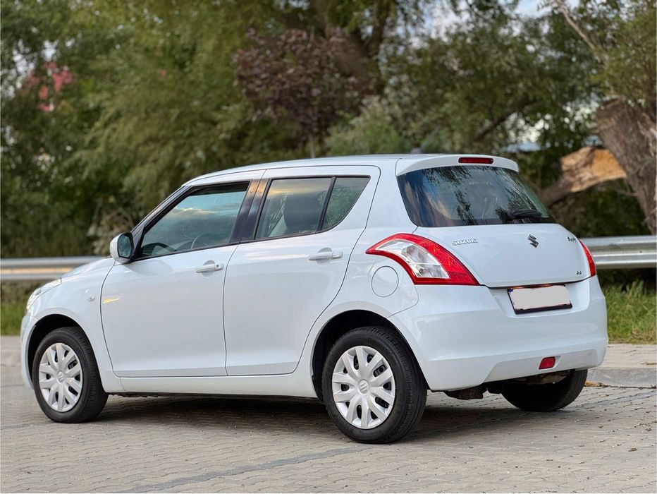 Suzuki Swift 4x4 - 2012 - 1.3 benzina - Alb perlat / Klima