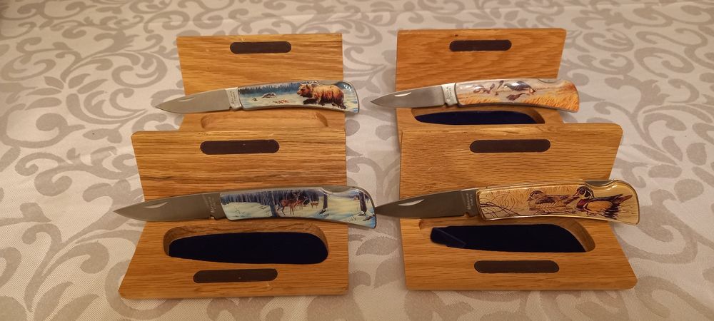 Сгъваеми ловни ножове MAGNUM с различни животни, специална кутия. Нож.