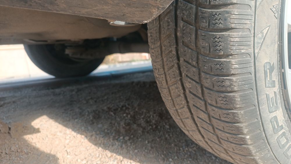 Продам зимние шины с дисками с колпаками