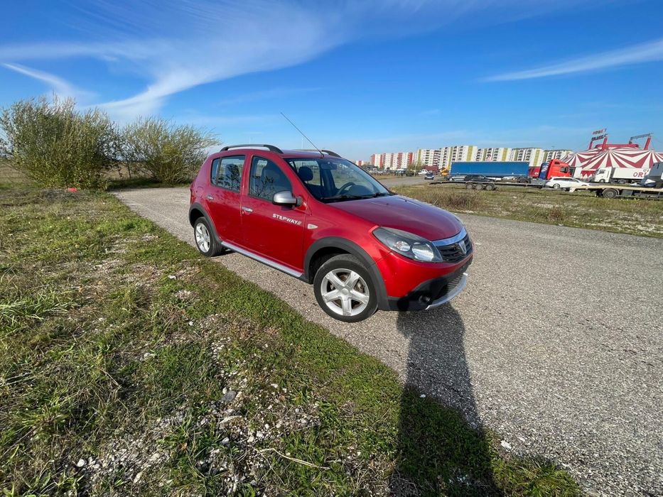 Dacia Sandero 1.6 benzină 2011 Ac 212000 km rosie cutie manuala 84 cp