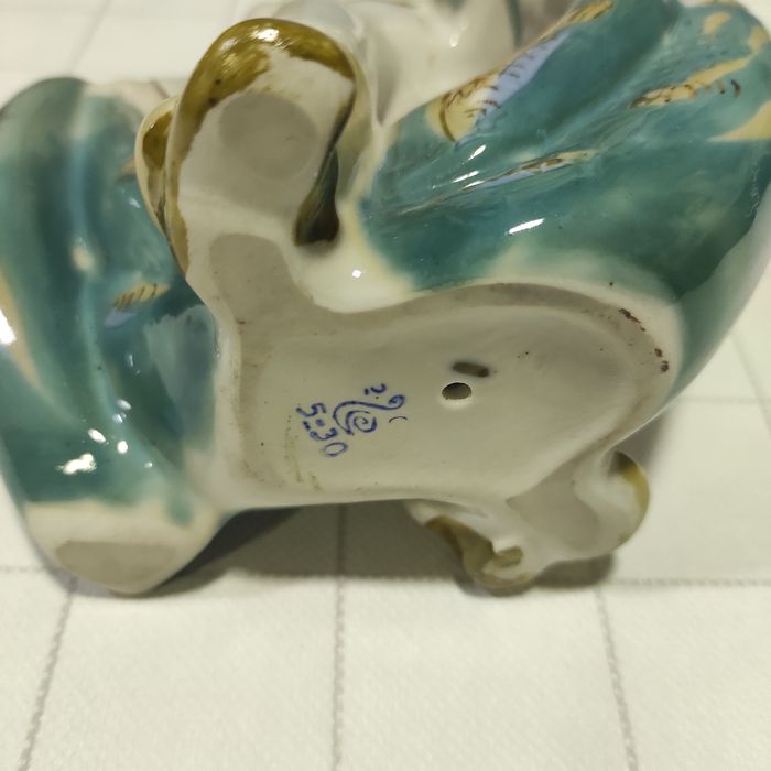 СТАУЭТКА Рыбак с сетью