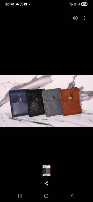 Бумажники из натуральной кожи