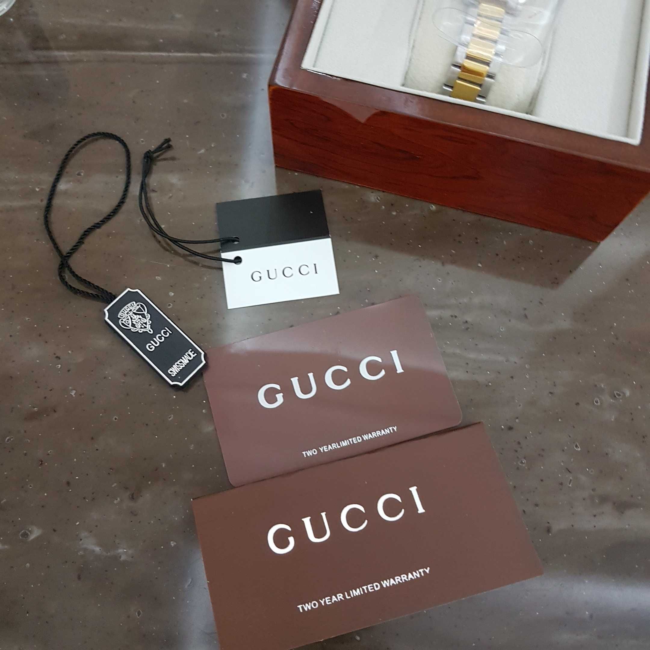 Женские часы Gucci