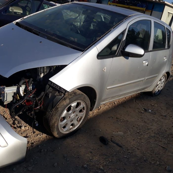 Usa stanga fata Mitsubishi Colt 1300 benzina