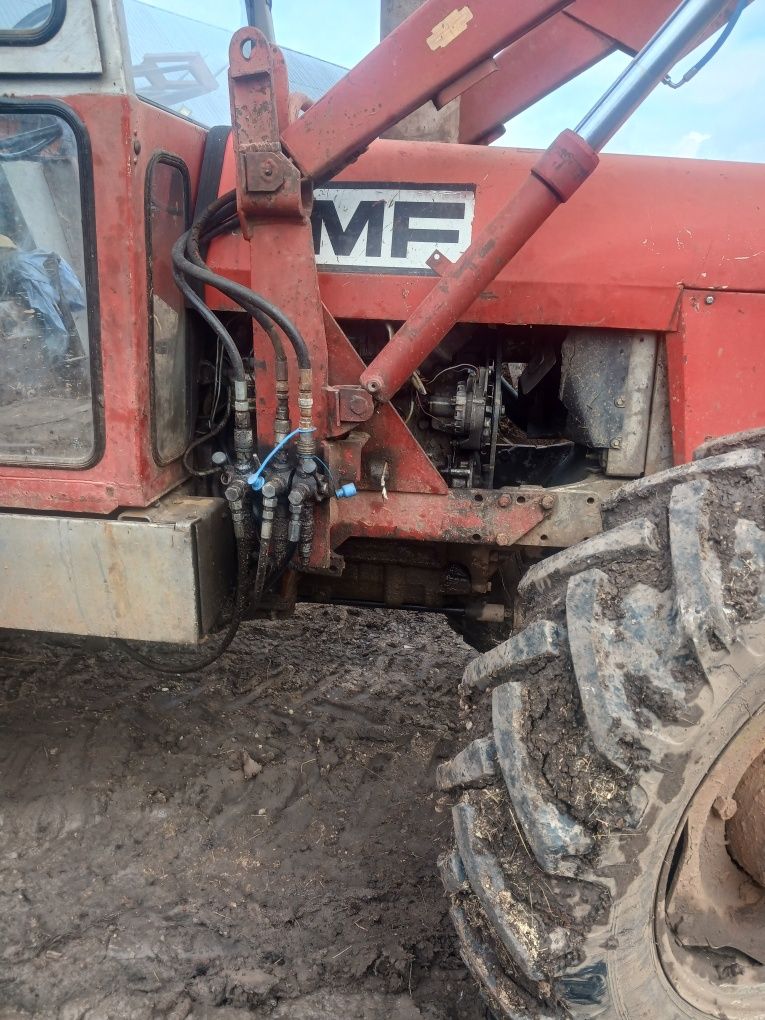 Vând tractor MF 4x4 595