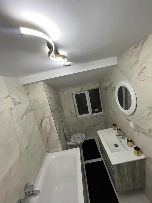 Chirie camera privata lux dar baia bucataria la comun centru tg cucu