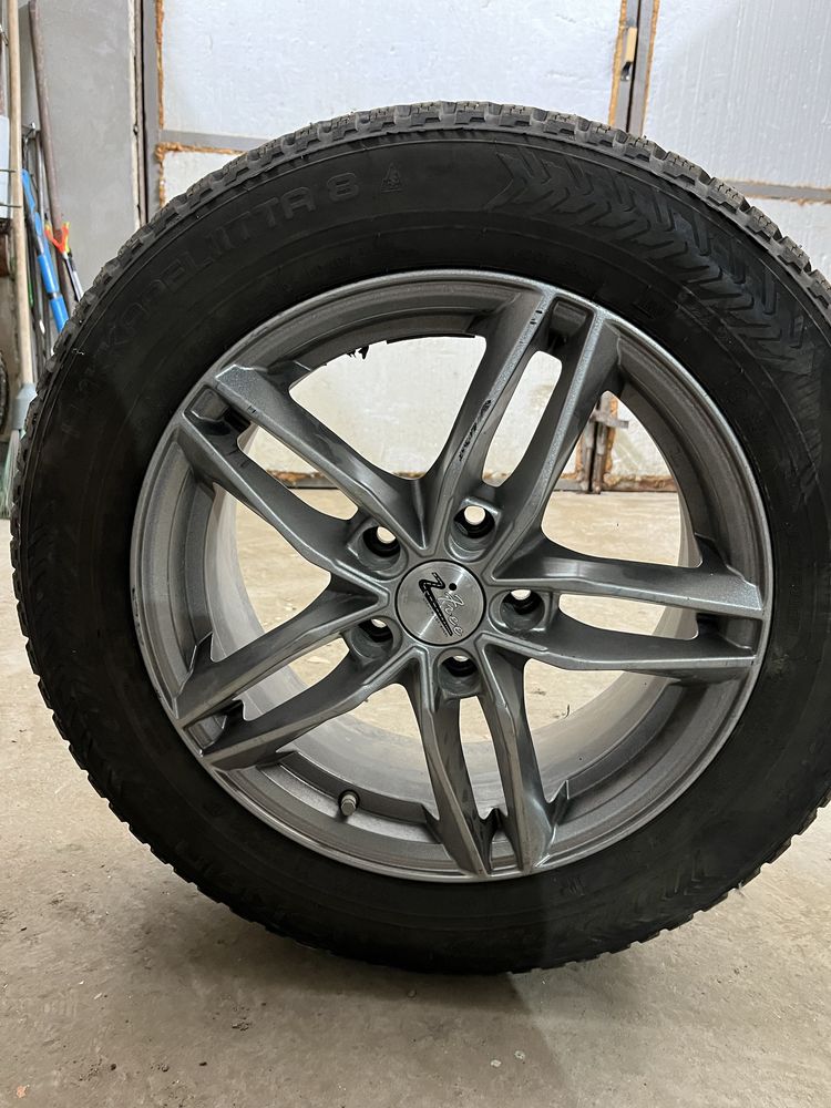 Продам шины с дисками Nokian Hakkepelita 8