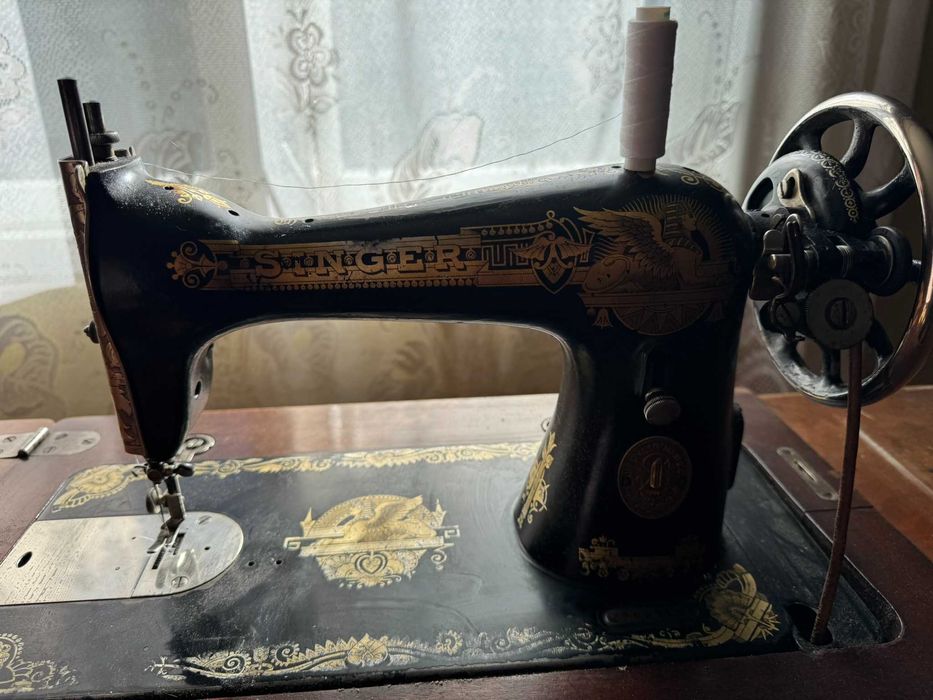 Vand masina de cusut singer