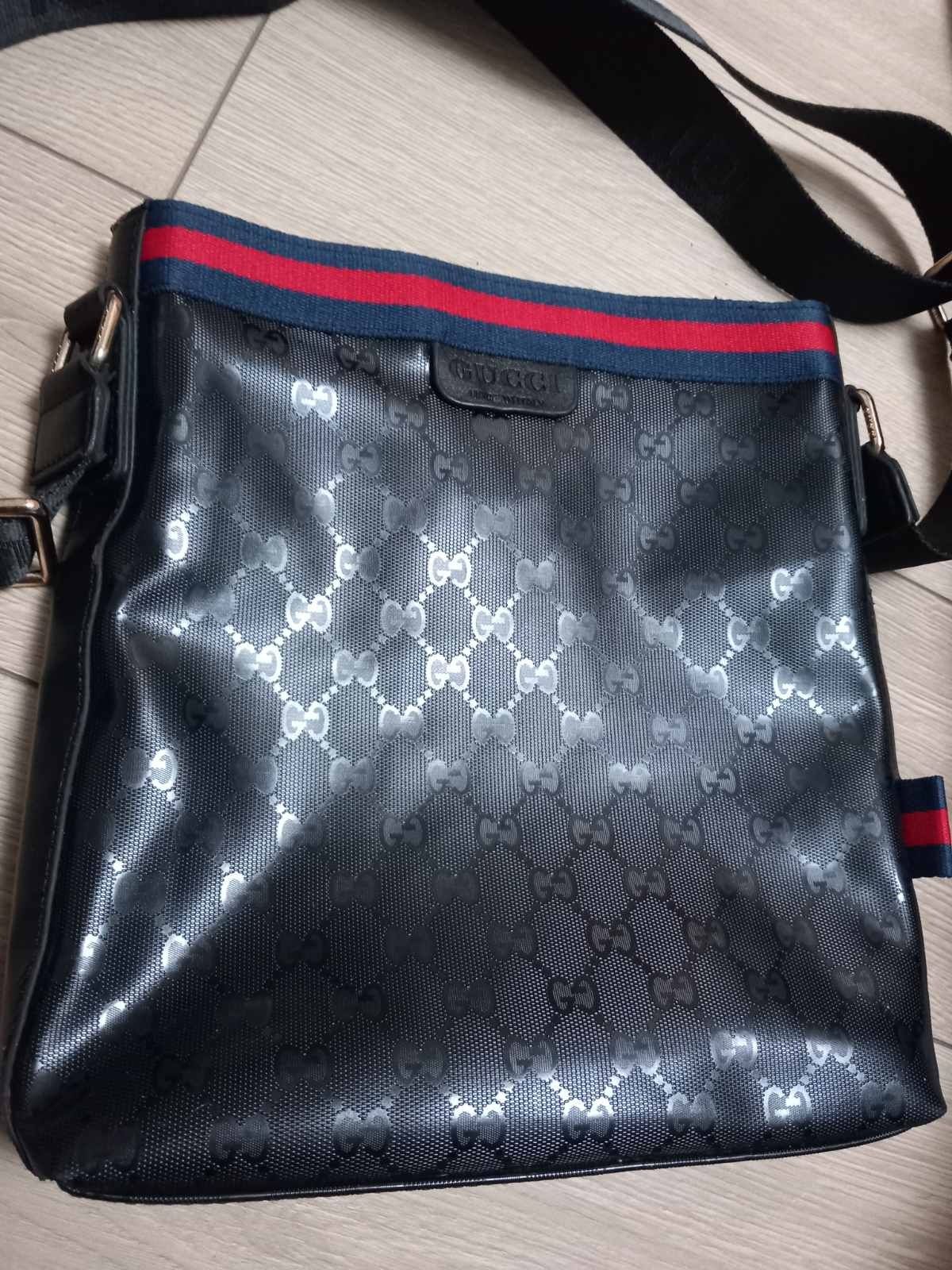 Gucci man bag...