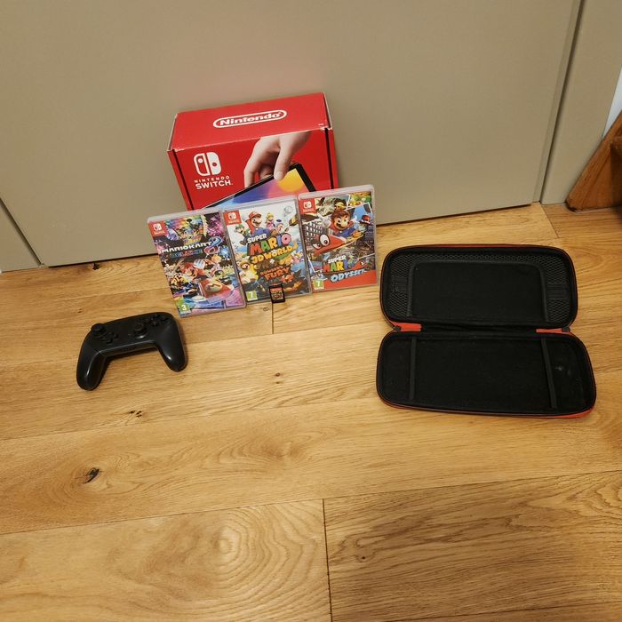 Nintendo switch oled model cu aceste acesorii negociabile