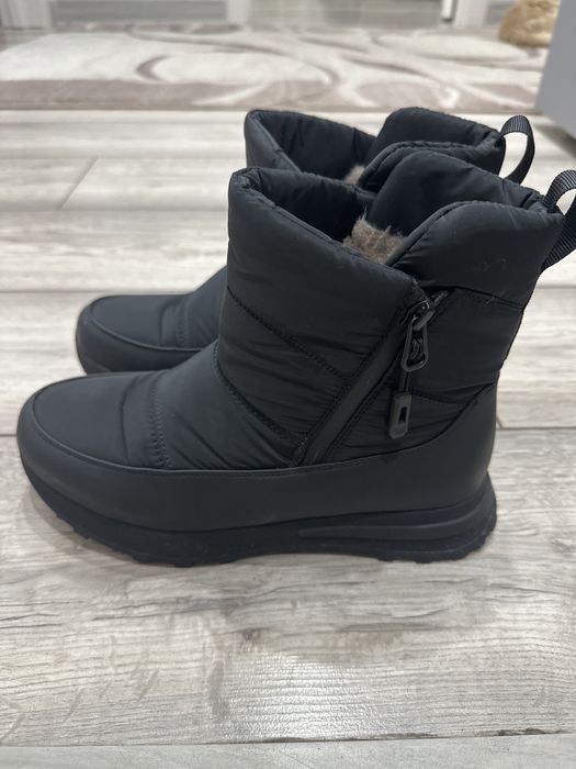 Продам сапоги новые