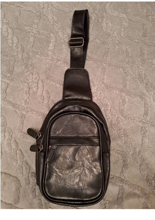 Продаю кожаную барсетку.