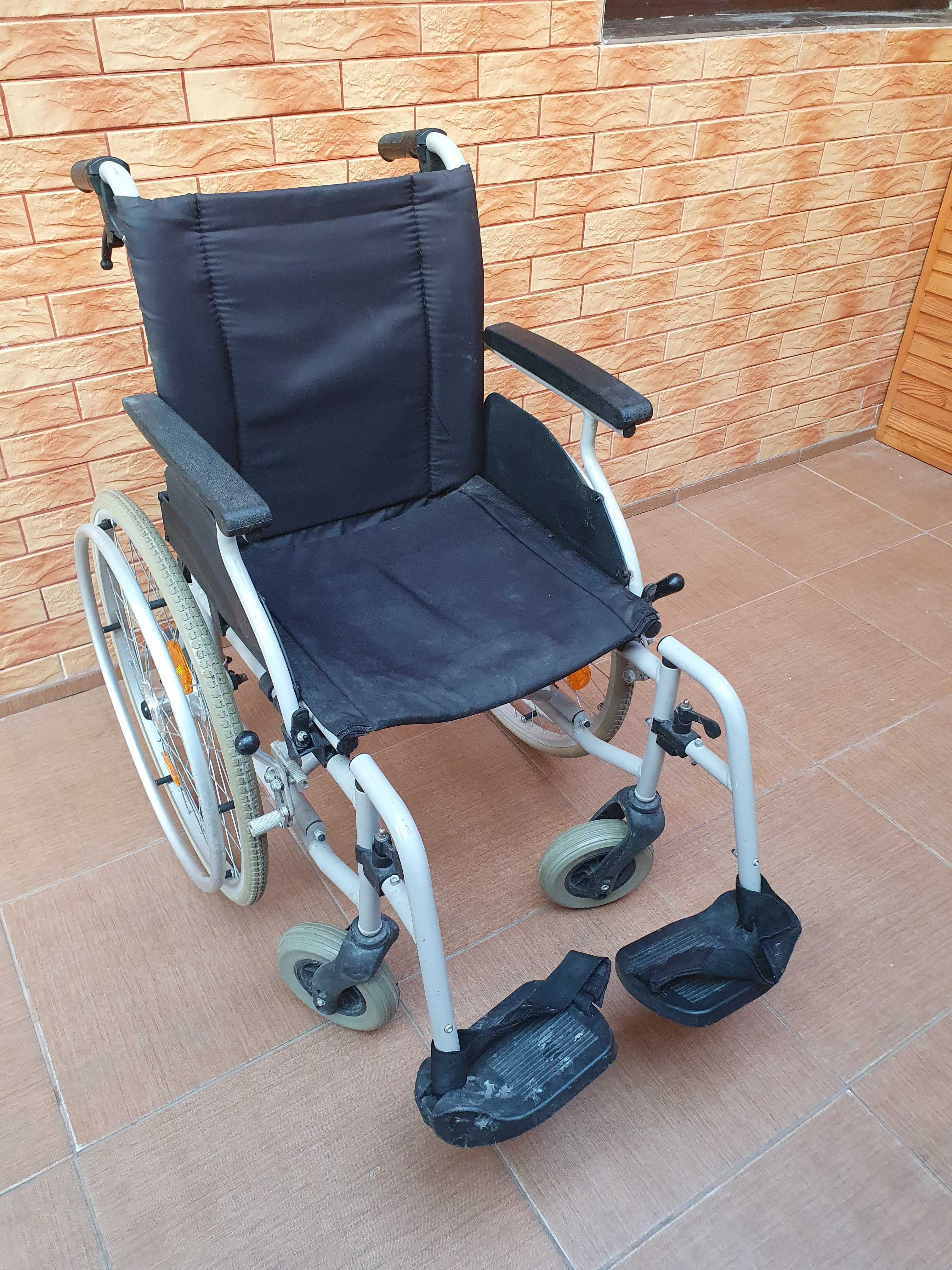 Carucior cu roti pt persoane cu dizabilități.