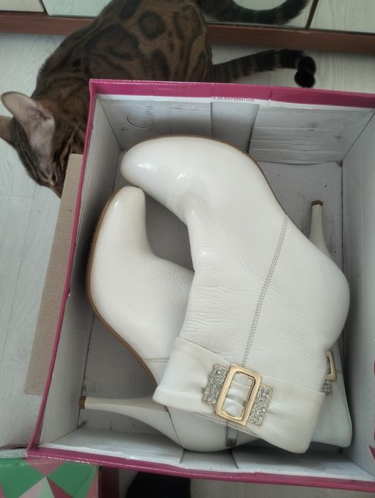 Продам новые сапоги