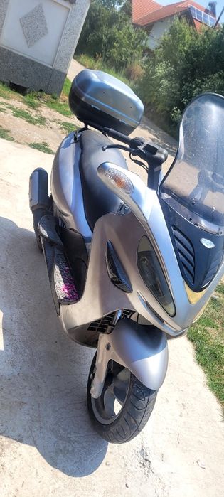 Vand sau schimb malaguti madison 250 cc