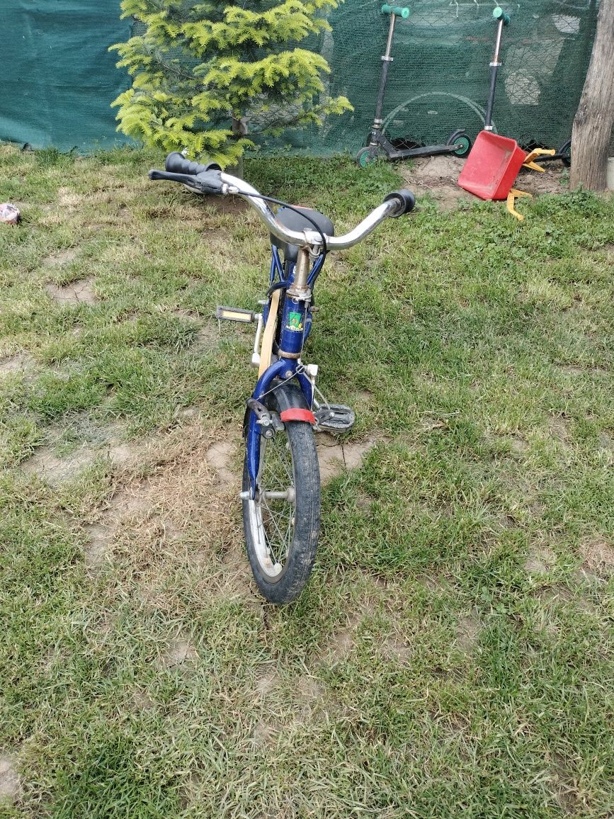 Vând bicicleta copii 16