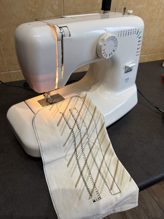 Masina de cusut festonat si butoniere TCM