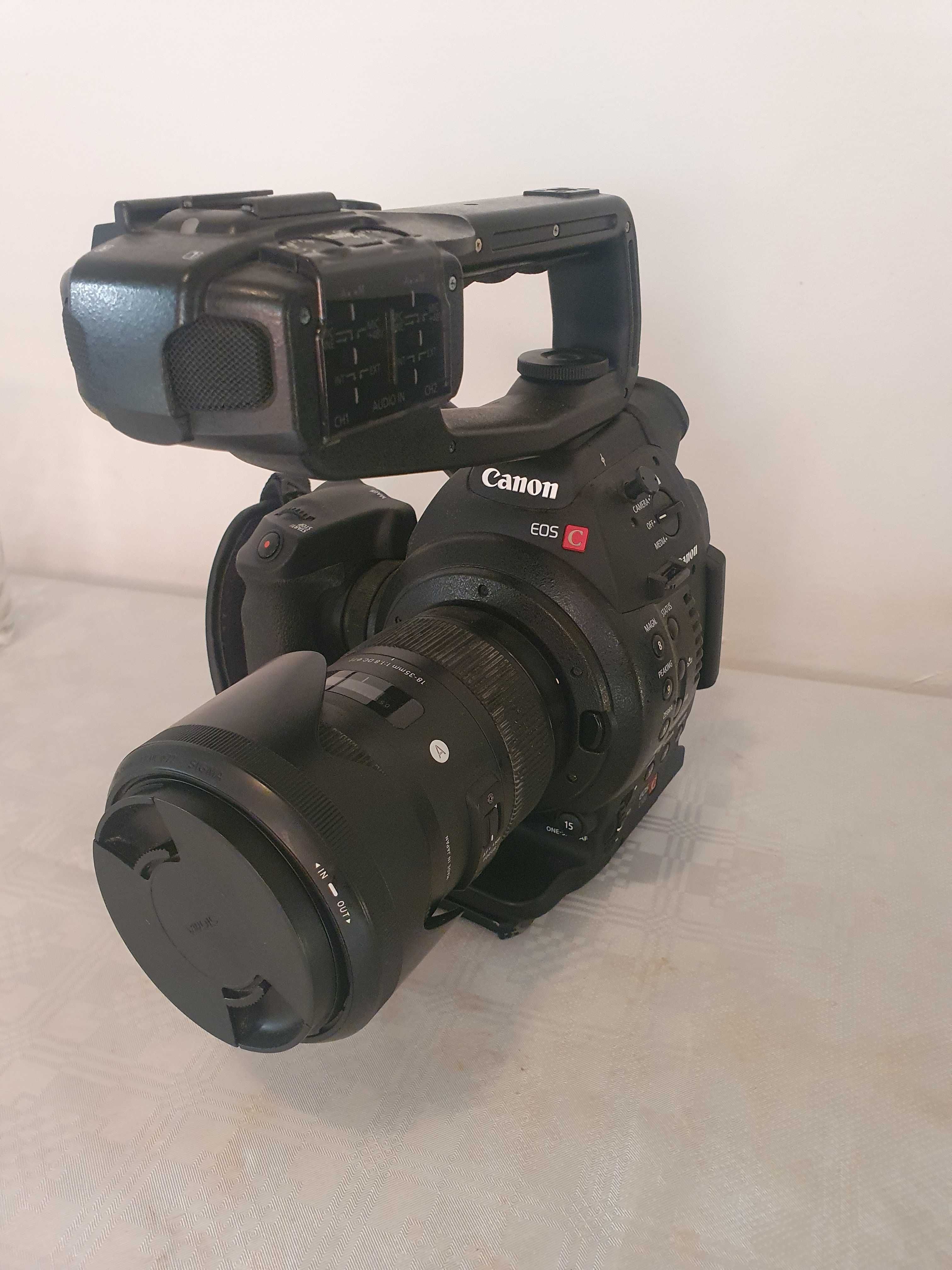 Vind camera Canon C100 DAF cu obiectiv sigma