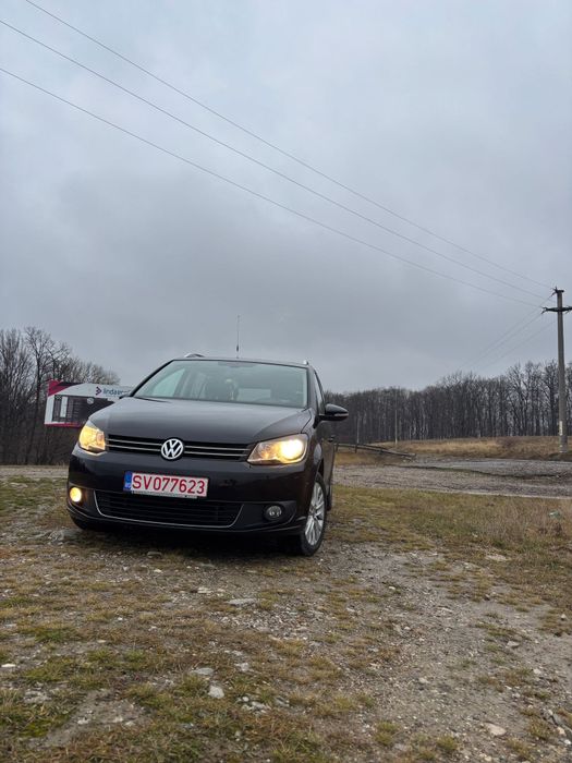 VW Touran 2l , 140 cp , 7 locuri,  2013