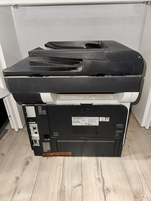 Принтер HP LaserJet Pro MFP M521dn