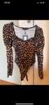 Body animal print marca PrettyLittleThing