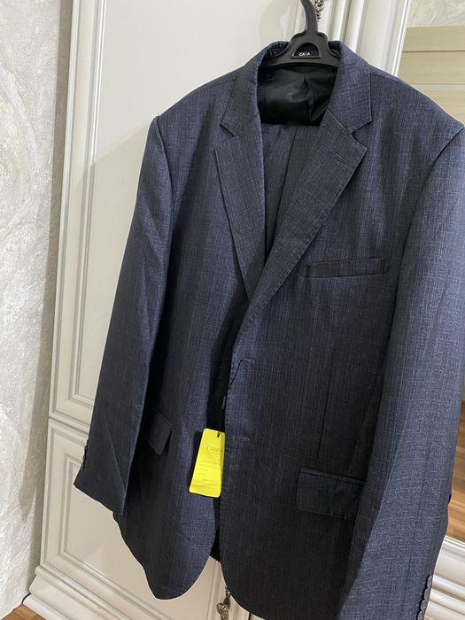 Продам мужской костюм ,новый.