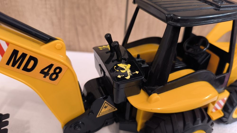 Jucărie Buldoexcavator interactiv mecanizat gen Bruder