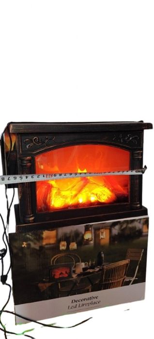 Декоративна коледна камина - уют и празнично настроение във всеки дом