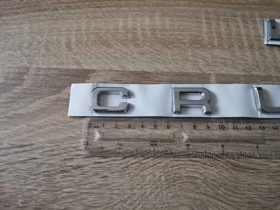 Toyota Land Cruiser сребрист надпис лого