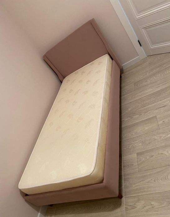Продам новый кровать с ортопедическим матрасом