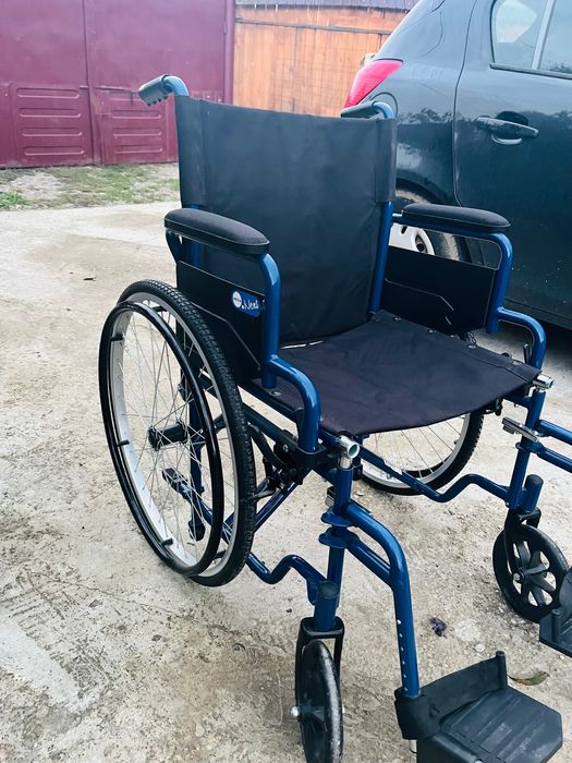 Scaun cu rotile in stare buna