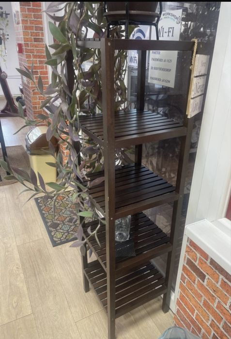 IKEA MUSKAN shelving unit in dark brown.