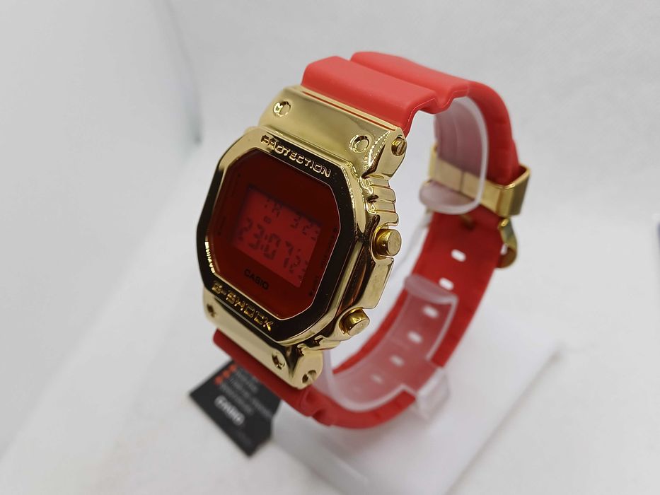 Ceas Casio g shock gm 5600cx Metal Gold-red Nou,Garantie 2 ANI