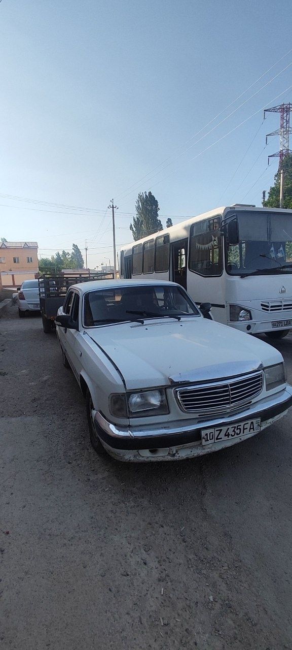 Продаю Волгу 3110 с прицепом