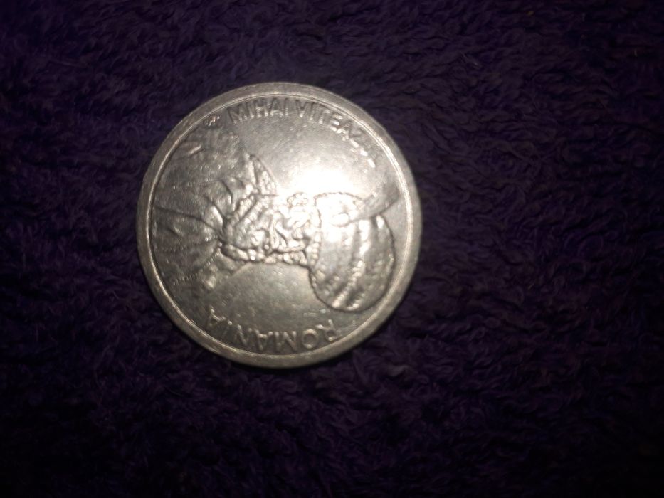 Vând monedă de 100 lei