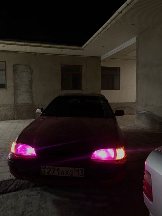 Тойота карина е