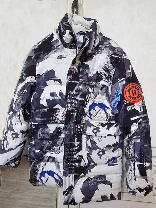 Продам пуховик для мальчика 10-11 лет