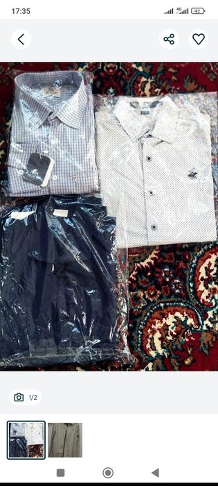 Рубашки мужские новые.