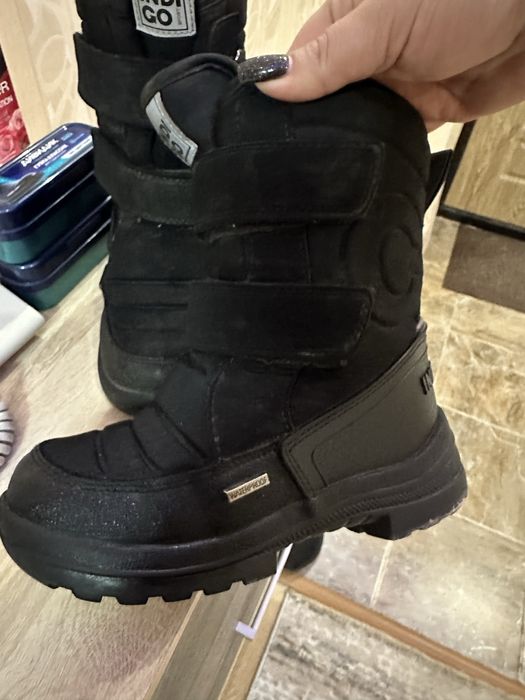 Сапоги зимние в отлтчном  состоянии