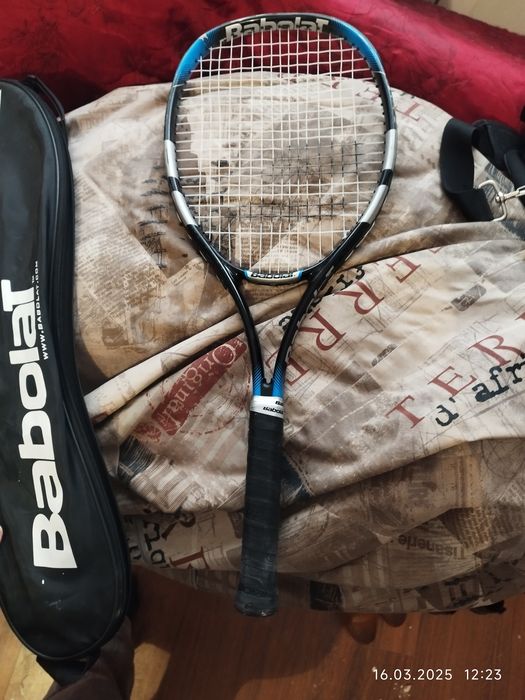 Теннисная ракетка