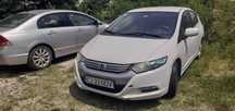 Auto Honda Insight hybrid automata consum 5% bolt uber ride-sharing