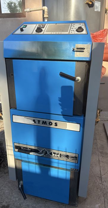 Vând centrala Atmos-32kw, cu gazeificare, pe lemn si carbune!
