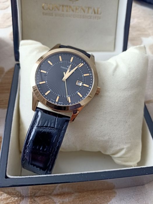 Часы континенталь